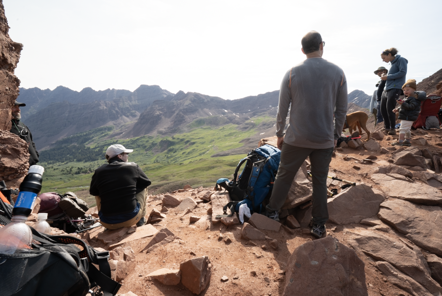 Top of a crowded with humans West Maroon Pass