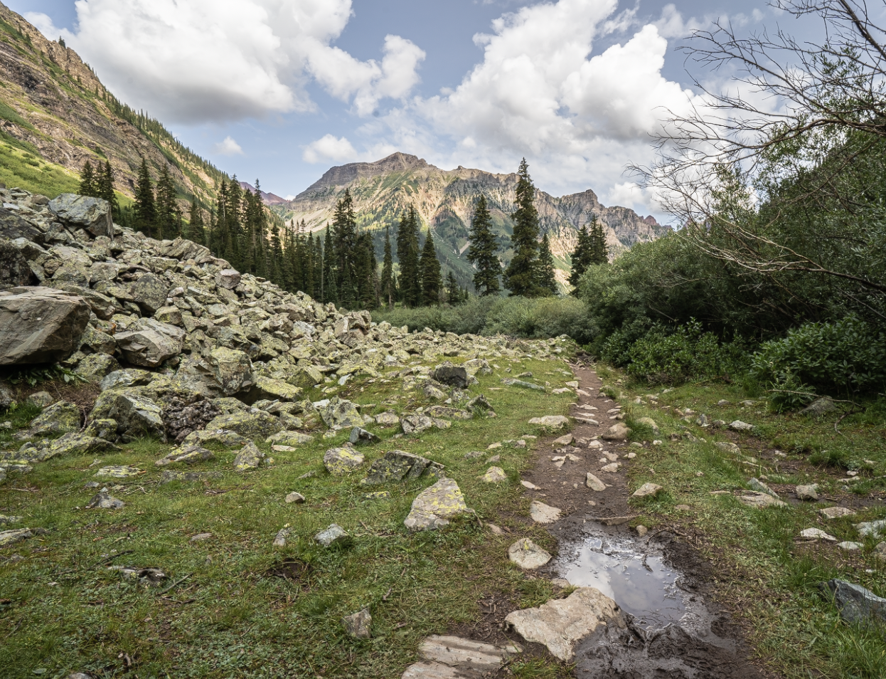 Heading up the trail looking towards the mountains over Crater Lake