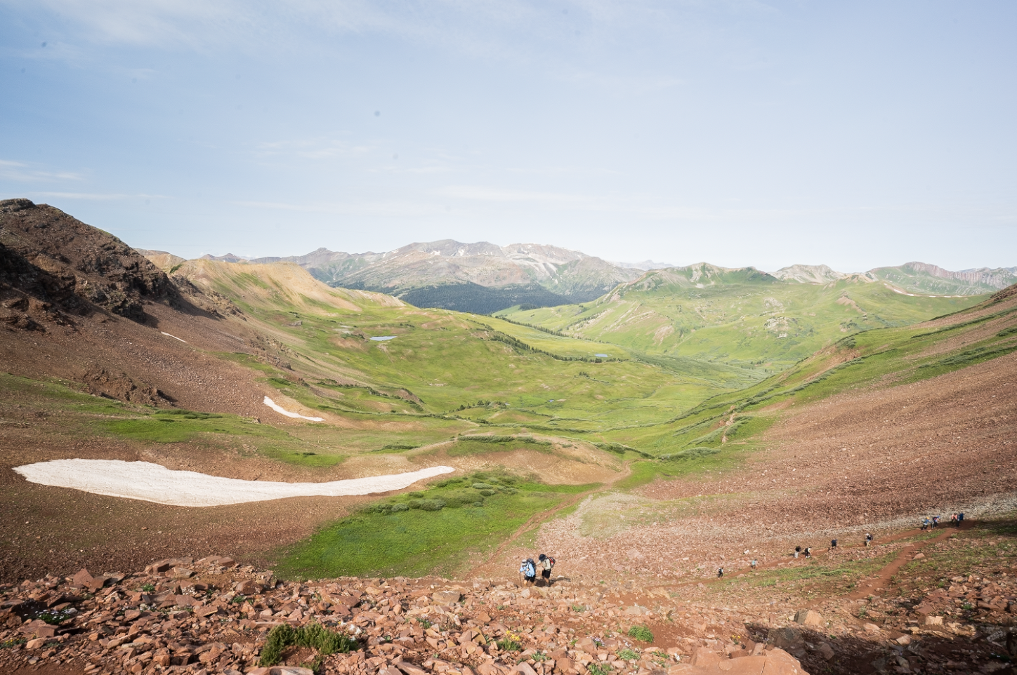 Looking back, atop West Maroon Pass, at the lush meadows from where I just came